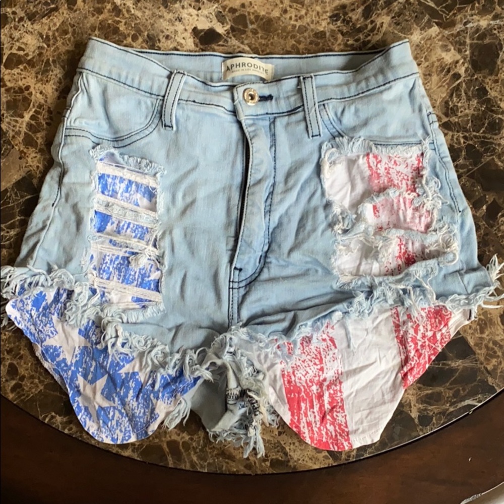 ripped blue jean shorts